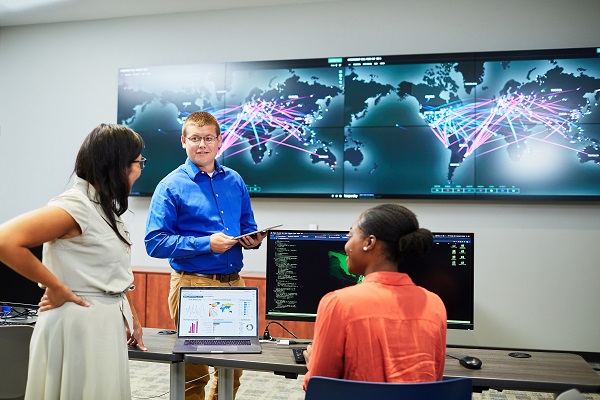 3 Colleagues discussing on the cyber security programs