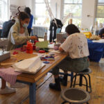 Group of people working on textile design