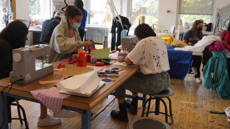 Group of people working on textile design